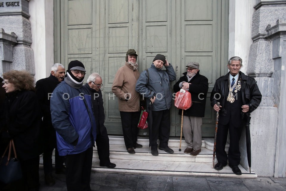 Pensioners queue to receive one-off 