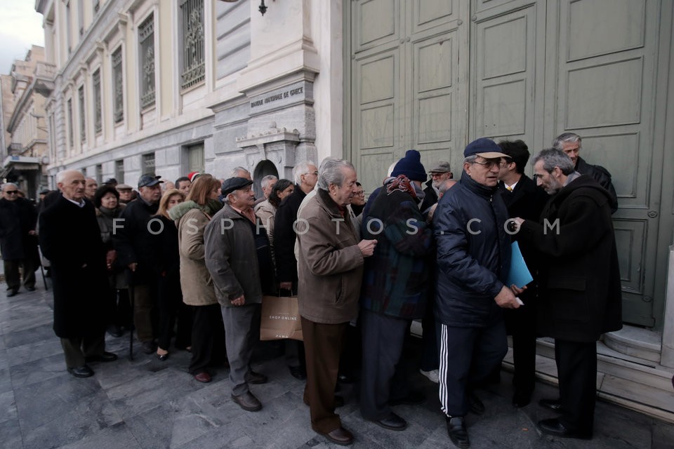 Pensioners queue to receive one-off 