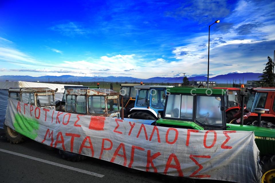 Greek farmers protest and block national roads