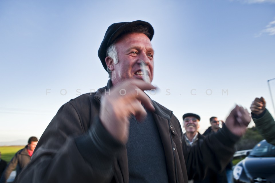 Greek farmers protest and block national roads