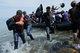 Asian migrants and Syrians refugees at the east coast of Lesbos island / Πρόσφυγες και μετανάστες αποβιβάζονται στην Λέσβο